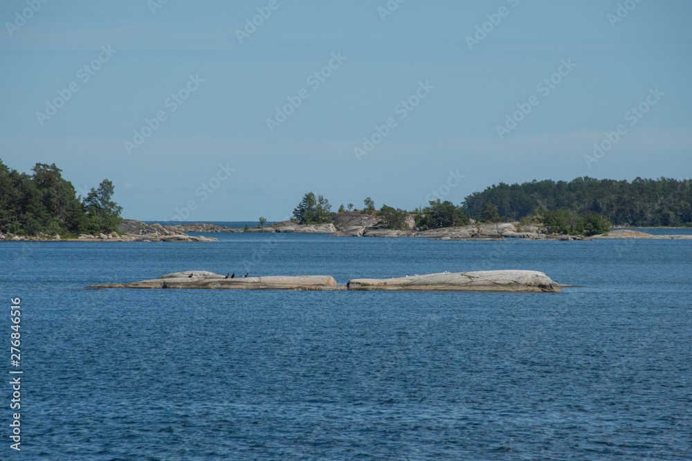 Islands in the Stockholm outer archipelago a sunny sommer day around the bay Möja Västerfjärd Islands in the Stockholm outer archipelago a sunny sommer day around the bay Möja Västerfjärd