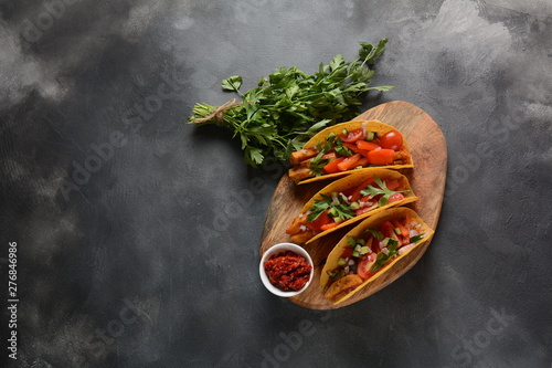 Tacos with grilled chicken and vegetables - Mexican food style photo