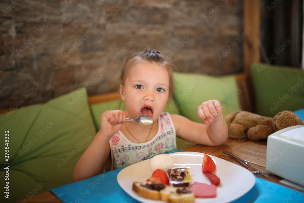 funny girl has breakfast on the veranda funny girl has breakfast on the veranda