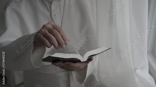 Pope reads the Bible in his office
