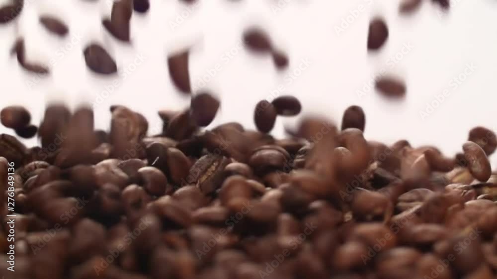 Coffee beans falling pouring  Slow Motion Closeup on White Background