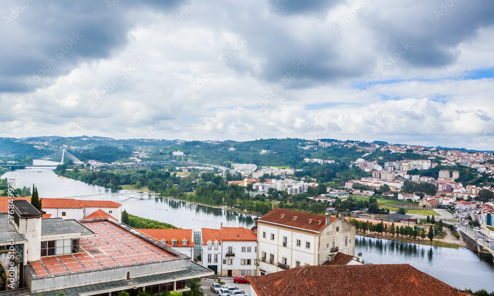 Cityscape over the roofs of Coimbra with the Mondego River, Portugal