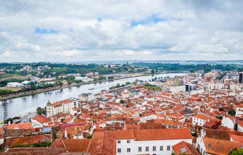 Cityscape over the roofs of Coimbra with the Mondego River, Portugal