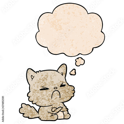 cartoon angry cat and thought bubble in grunge texture pattern style