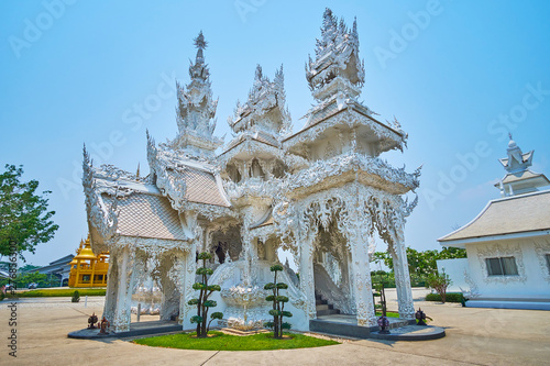 The scenic shrine in White Temple complex, Chiang Rai, Thailand photo