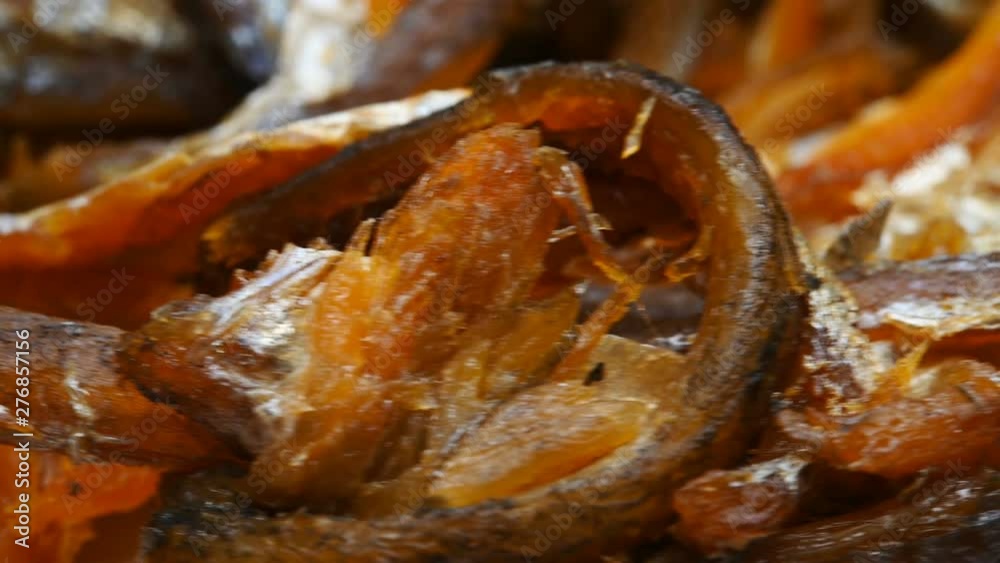 side view dry salty fishes turning and pause side view dry salty fishes turning and pause