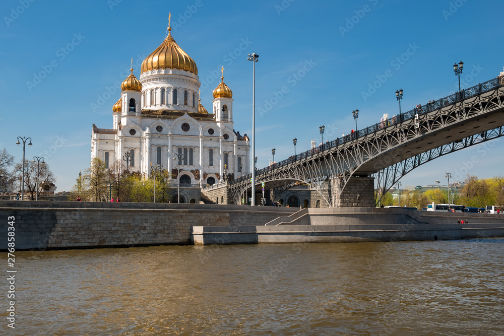 Moscow, Russia - May 6, 2019: View of the Cathedral of Christ the Savior and the Patriarchal Bridge from the Moscow River on a summer day