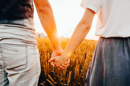 a couple in wheat field