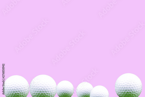 golf ball isolated on pink background