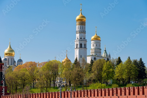 Moscow, Russia - May 6, 2019: View of the Moscow Kremlin, the  Assumption Belfry and cathedrals on Cathedral Square on a summer day