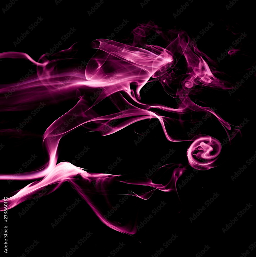 Fototapeta premium Purple smoke on black background