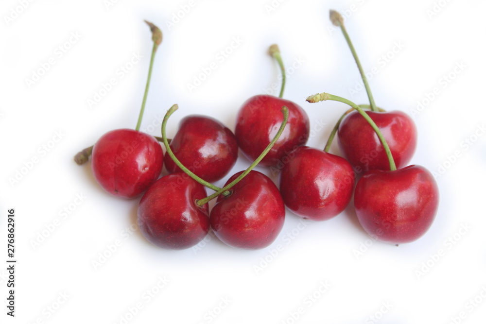 Ripe fresh cherries isolated on white background Ripe fresh cherries isolated on white background