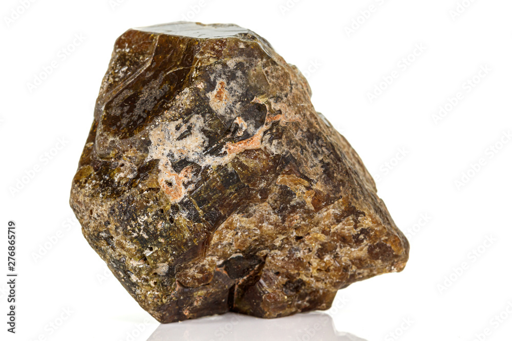 Macro of a mineral stone Vesuvianite on a white background Macro of a mineral stone Vesuvianite on a white background