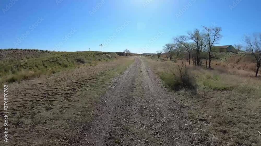 HYPER LAPSE - Traveling down a dirt path in the open country. HYPER LAPSE - Traveling down a dirt path in the open country.