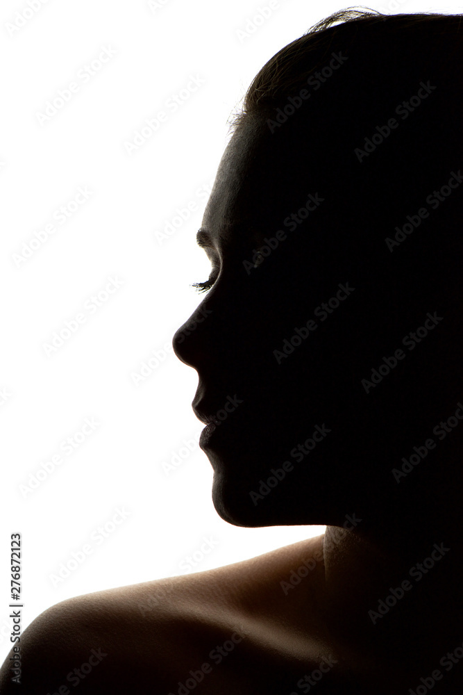 Silhouette of a young woman isolated on white