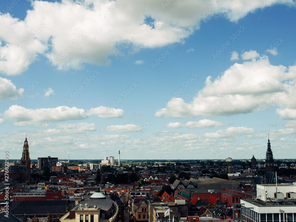 Fototapeta premium View over historic part of Groningen city under blue sky with clouds