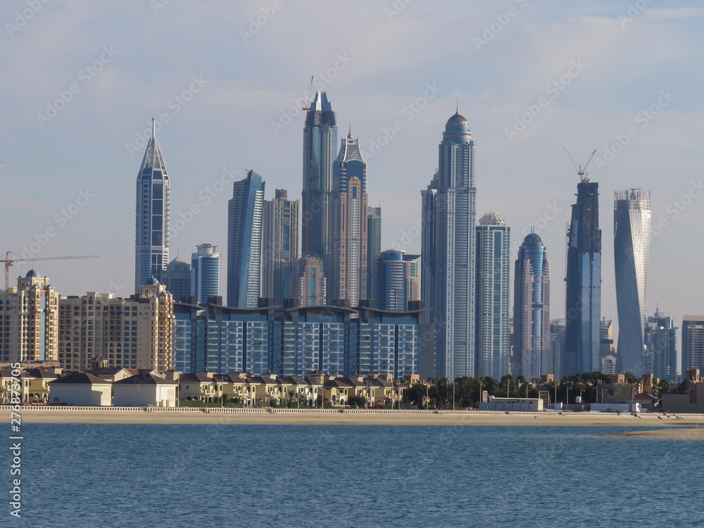 View of the artificial island of Palm Jumeirah and the skyscrapers of Dubai from the beach of Aquaventure water park, View of the artificial island of Palm Jumeirah and the skyscrapers of Dubai from the beach of Aquaventure water park,