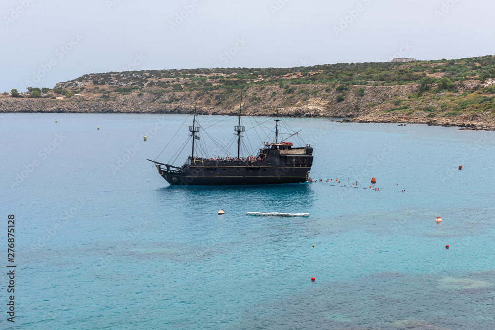 Touristic boat navigating in the Mediterranean Sea in Cyprus