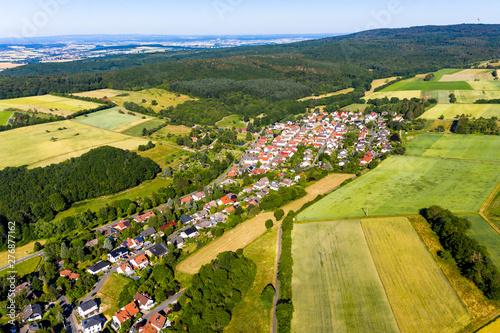 Aerial view, Agricultural area, Meadows, fields of cereals, villages, forests. Wetterau, Hesse, Germany © David Brown