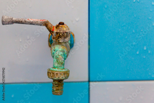 Rust stains on the water valve, Old water valve in the bathroom.