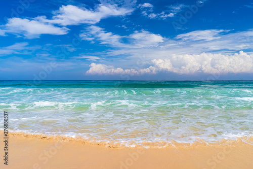 Beautiful tropical beach with blue sky and white clouds abstract texture background. Copy space of summer vacation and holiday business travel concept.