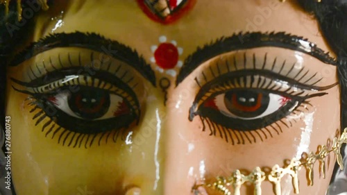 Close up front view face of Goddess Maa Durga Idol. A symbol of strength and power as per Hinduism. Portrait was taken during Durga Puja celebrations from a famous potter studio in Kumartuli in Kolkat