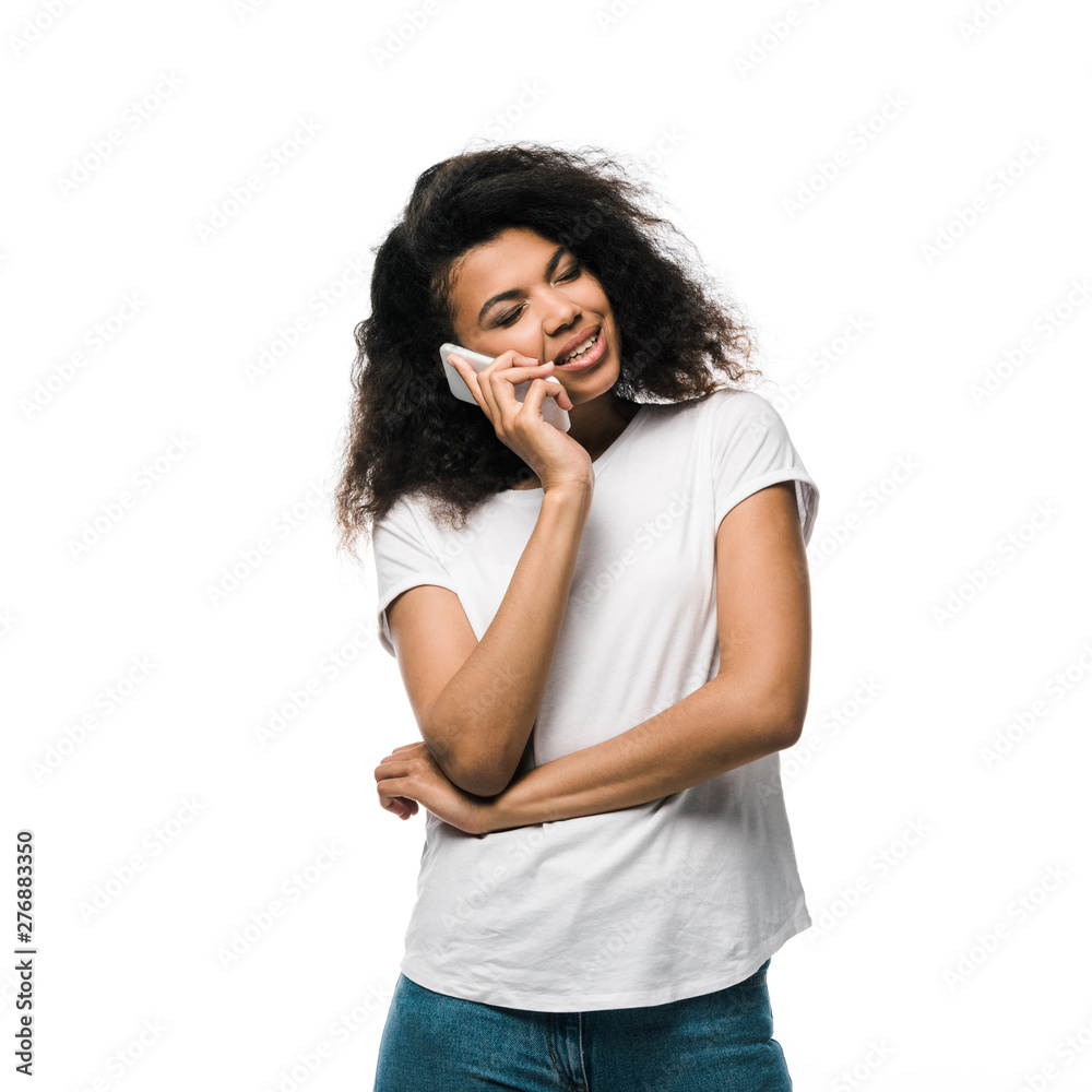 happy african american girl talking on smartphone isolated on white happy african american girl talking on smartphone isolated on white