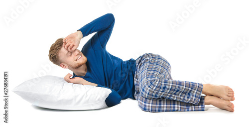 Handsome sleepy man with pi...