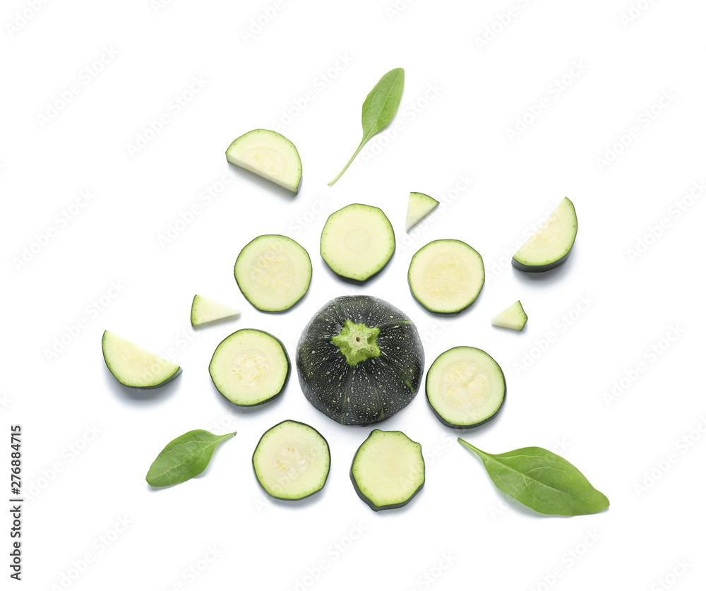 Cut zucchini squashes on white background