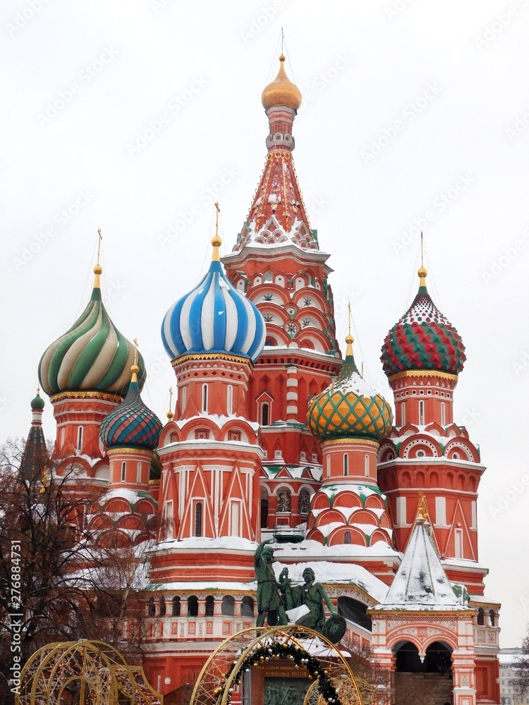 Moscow, Russia - January 31, 2019: Saint Basil's Cathedral covered with snow in Red Square on a cloudy day Moscow, Russia - January 31, 2019: Saint Basil's Cathedral covered with snow in Red Square on a cloudy day