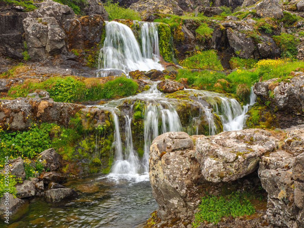 Smaller waterfalls below the better known Dynjandifoss in the Westfjords of Iceland Smaller waterfalls below the better known Dynjandifoss in the Westfjords of Iceland