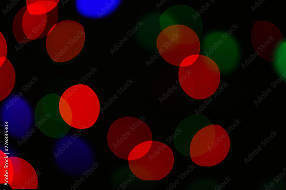 Colorful defocused lights on dark background