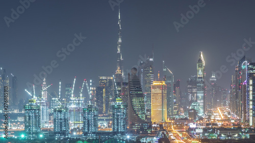 Dubai skyline with beautiful city center lights and Sheikh Zayed road traffic night timelapse, Dubai, United Arab Emirates