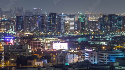 Aerial view of neighbourhood Deira with typical buildings night timelapse, Dubai, United Arab Emirates © neiezhmakov