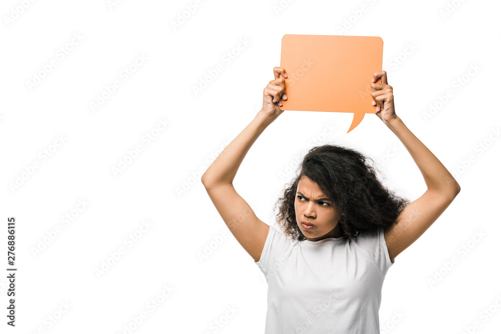 angry african american woman holding orange speech bubble isolated on white angry african american woman holding orange speech bubble isolated on white