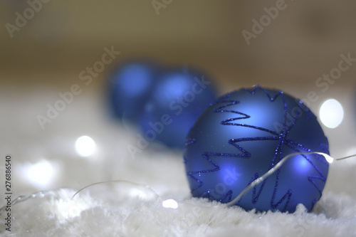 christmas balls with ribbon on white background