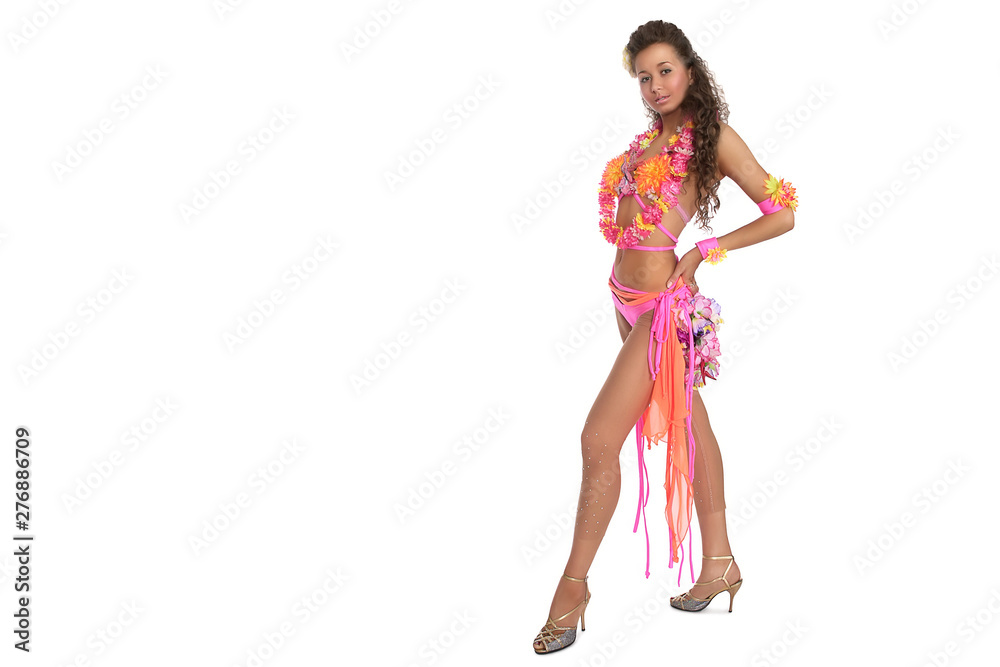 Attractive Caucasian girl in hula costume. Beautiful exotic girl with Hawaiian accessories
