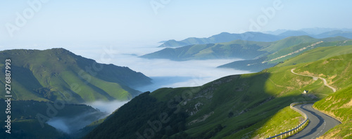 mountain road with sea of clouds in the pass of Larrau, Pyrenees of France