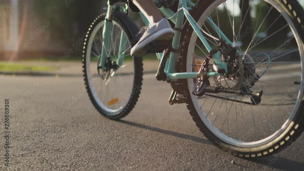 Unrecognizable Child Girl Riding Bike At Sunset Unrecognizable Child Girl Riding Bike At Sunset