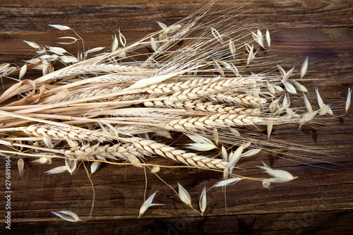 Bunch of ripe ears of wheat, barley and oats