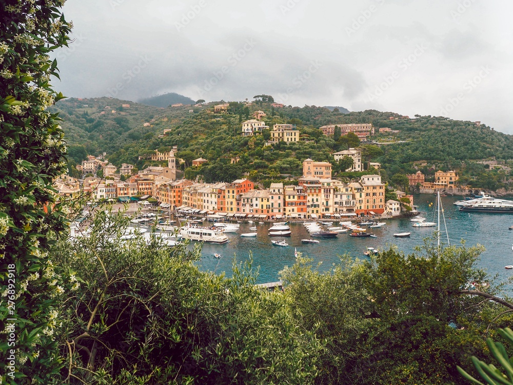 Portofino Liguria, colorful houses and yachts in the Bay, panorama of the city