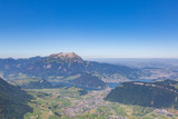 Pilatus mountain, village of Stans, lake Lucerne with blue sky
