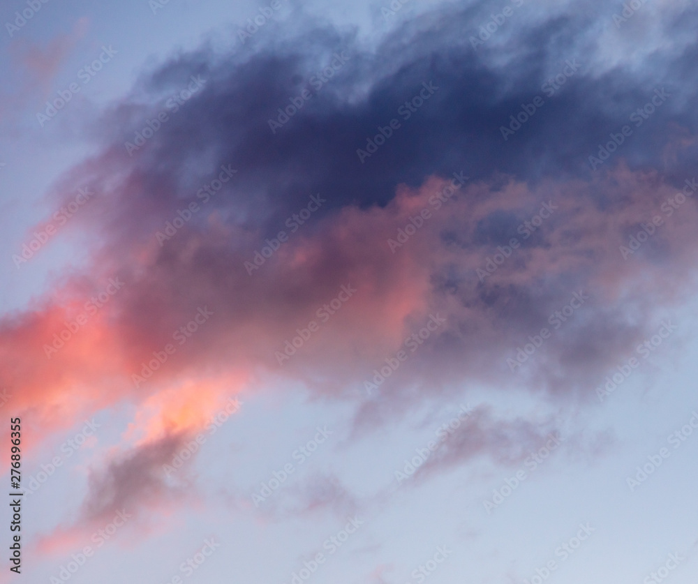 Fototapeta premium Beautiful clouds at sunset as background