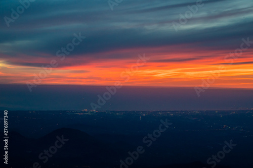 Fototapeta Naklejka Na Ścianę i Meble -  Twilight to Night from the jet plane view red orange blue sky with the light of Thailand city below