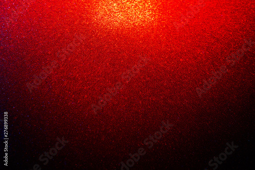 Abstract background with a spotlight covering the foam sheet. Mixed lighting photo