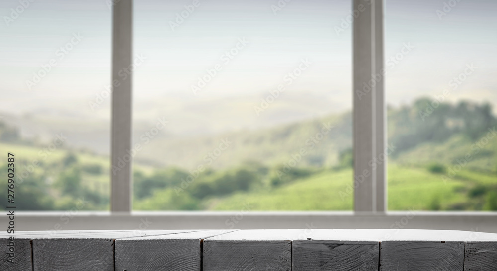 Fototapeta premium Desk of free space and window background 