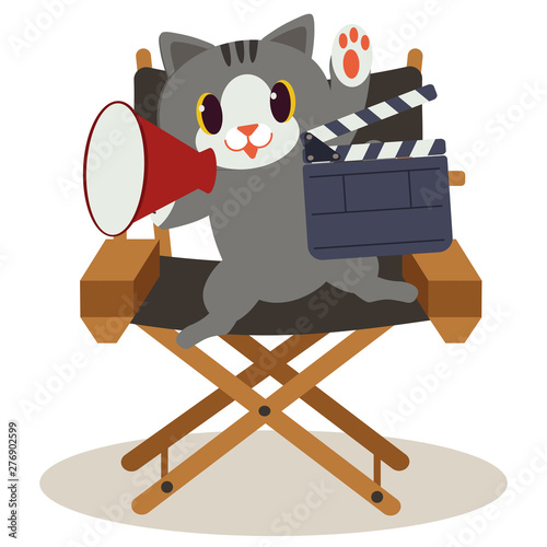 a character of cute cat sitting on the director chair. cat is making the movie and it so happy. cute cat working as director on the white background. a cute cat in flat vector style