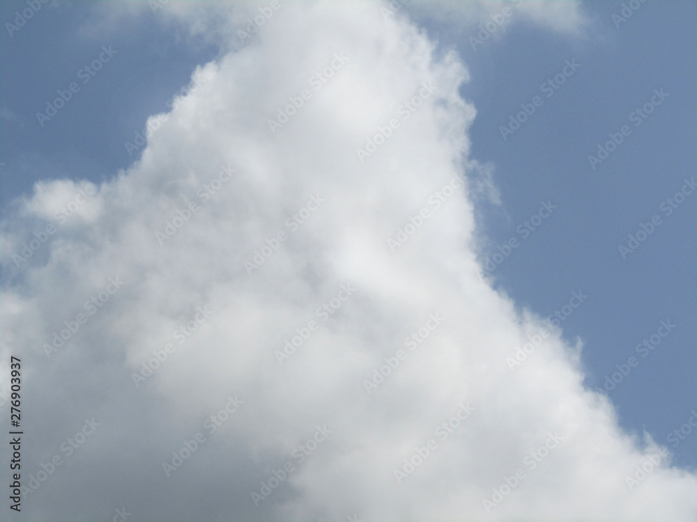Mild white cloud on blue sky in rainy season