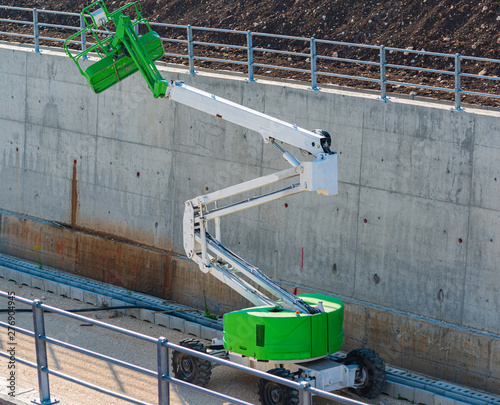 Self-propelled aerial platform Articulated with diesel engine used in the construction of a new railway line photo