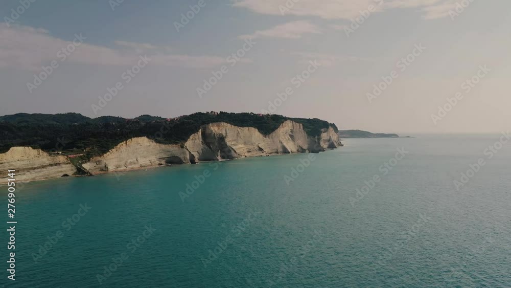 Aerial shot of Cliffs in Logas beach Peroulades, Greece Aerial shot of Cliffs in Logas beach Peroulades, Greece